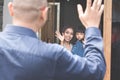 Kid waving goodbye to parent Royalty Free Stock Photo