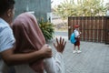 Kid waving goodbye to parent before school Royalty Free Stock Photo