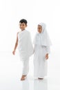 Kid wearing muslim ihram clothes and dress