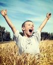 Kid in the Wheat Field Royalty Free Stock Photo