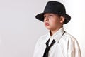 Kid in white shirt with black hat and tie Royalty Free Stock Photo