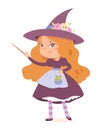 Kid witch character in Halloween party,cute girl in magic costume and hat holding stick Royalty Free Stock Photo