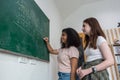 Kid write on chalk board. Back to school. Schoolchild in class. Happy kid writing green blackboard. Royalty Free Stock Photo