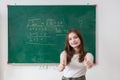 Kid write on chalk board. Back to school. Schoolchild in class. Happy kid writing green blackboard. Royalty Free Stock Photo