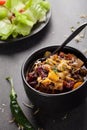 Kidney Bean Chili on dark charcoal background Royalty Free Stock Photo