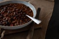 Kidney bean stew with ground beef, baked, beans, bell peppers, onions, garlic herbs, tomatoes on a plate Royalty Free Stock Photo