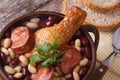 kidney beans with chicken and grilled sausages closeup horizontal Royalty Free Stock Photo