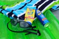 Beach towels and sunscreen