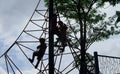 Kids advanture on climbing cargo rope net Royalty Free Stock Photo