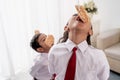 Kids against each other eating indonesian cracker on independence day Royalty Free Stock Photo