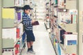 Kids asia boy reading books for education and go to school in library Royalty Free Stock Photo