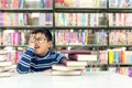 Kids asia boy reading books for education and go to school in library . Royalty Free Stock Photo