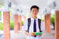 Kids back to school. Asian student with backpack Royalty Free Stock Photo