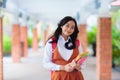 Kids back to school. Asian student with backpack Royalty Free Stock Photo