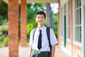 Kids back to school. Asian student with backpack Royalty Free Stock Photo