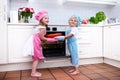 Kids baking apple pie Royalty Free Stock Photo