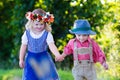 Kids in Bavarian costumes in wheat field Royalty Free Stock Photo