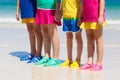 Kids beach shoes. Children summer sea footwear Royalty Free Stock Photo