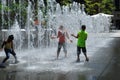 Kids beat the heat - cool off in water fountain