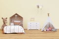 Kids bedroom with stuffed toy animals and play teepee. Royalty Free Stock Photo