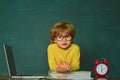 Kids being late for lesson. Time to learn concept. Blackboard background. School or college pupil showing parents a test Royalty Free Stock Photo