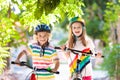 Kids on bike. Children on bicycle. Child biking Royalty Free Stock Photo
