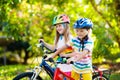 Kids on bike. Children on bicycle. Child biking Royalty Free Stock Photo