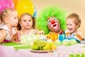Kids on birthday party with clown Royalty Free Stock Photo