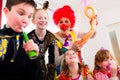 Kids birthday party with clown and lot of noise Royalty Free Stock Photo