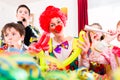 Kids birthday party with clown and lot of noise Royalty Free Stock Photo