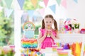 Kids birthday party. Little girl with cake. Royalty Free Stock Photo