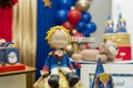 Kids birthday party decoration. Little prince theme party. Closeup of Little Prince in your small planet on blue background