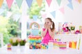 Kids birthday party. Little girl with cake. Royalty Free Stock Photo