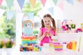 Kids birthday party. Little girl with cake. Royalty Free Stock Photo