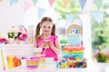 Kids birthday party. Little girl with cake. Royalty Free Stock Photo