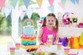 Kids birthday party. Little girl with cake. Royalty Free Stock Photo