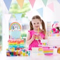 Kids birthday party. Little girl with cake. Royalty Free Stock Photo