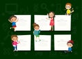 Kids with blank notepad board on green chalkboard background cartoon Royalty Free Stock Photo