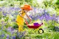 Kids in bluebell garden Royalty Free Stock Photo