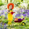 Kids in bluebell garden Royalty Free Stock Photo