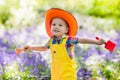 Kids in bluebell garden Royalty Free Stock Photo