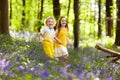 Kids in bluebell woods. Children play in park Royalty Free Stock Photo