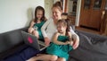 Kids bother their mother working remotely on a computer during a pandemic