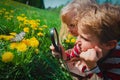 Kids - boy and girl - looking at butterfy, kids learning nature Royalty Free Stock Photo