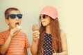 Kids boy and little girl eating ice cream. Royalty Free Stock Photo