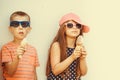 Kids boy and little girl eating ice cream. Royalty Free Stock Photo