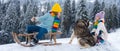 Kids boy and little girl with husky dog enjoying a sleigh ride. Children sibling together sledding, play outdoors in Royalty Free Stock Photo