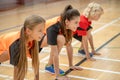 Kids in bright sportswear getting ready to start the game Royalty Free Stock Photo