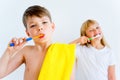 Kids brushing teeth