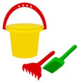 Kids bucket with rake and shovel Royalty Free Stock Photo